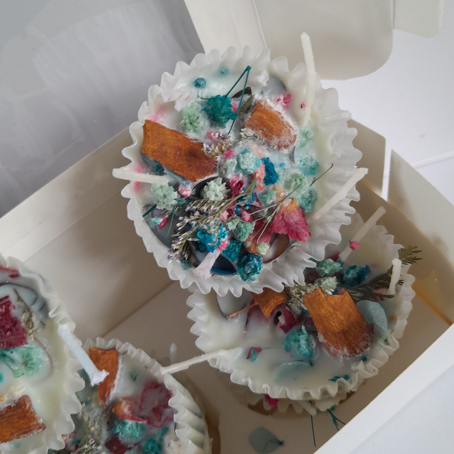 Scented firelighters displayed in a white box