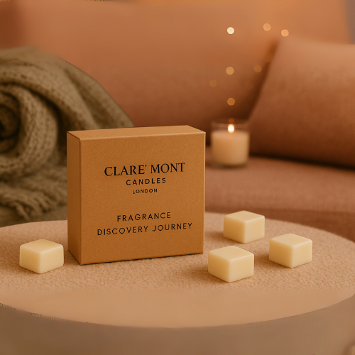 Clare Mont Candles packaging with wax cubes on a warm-toned surface