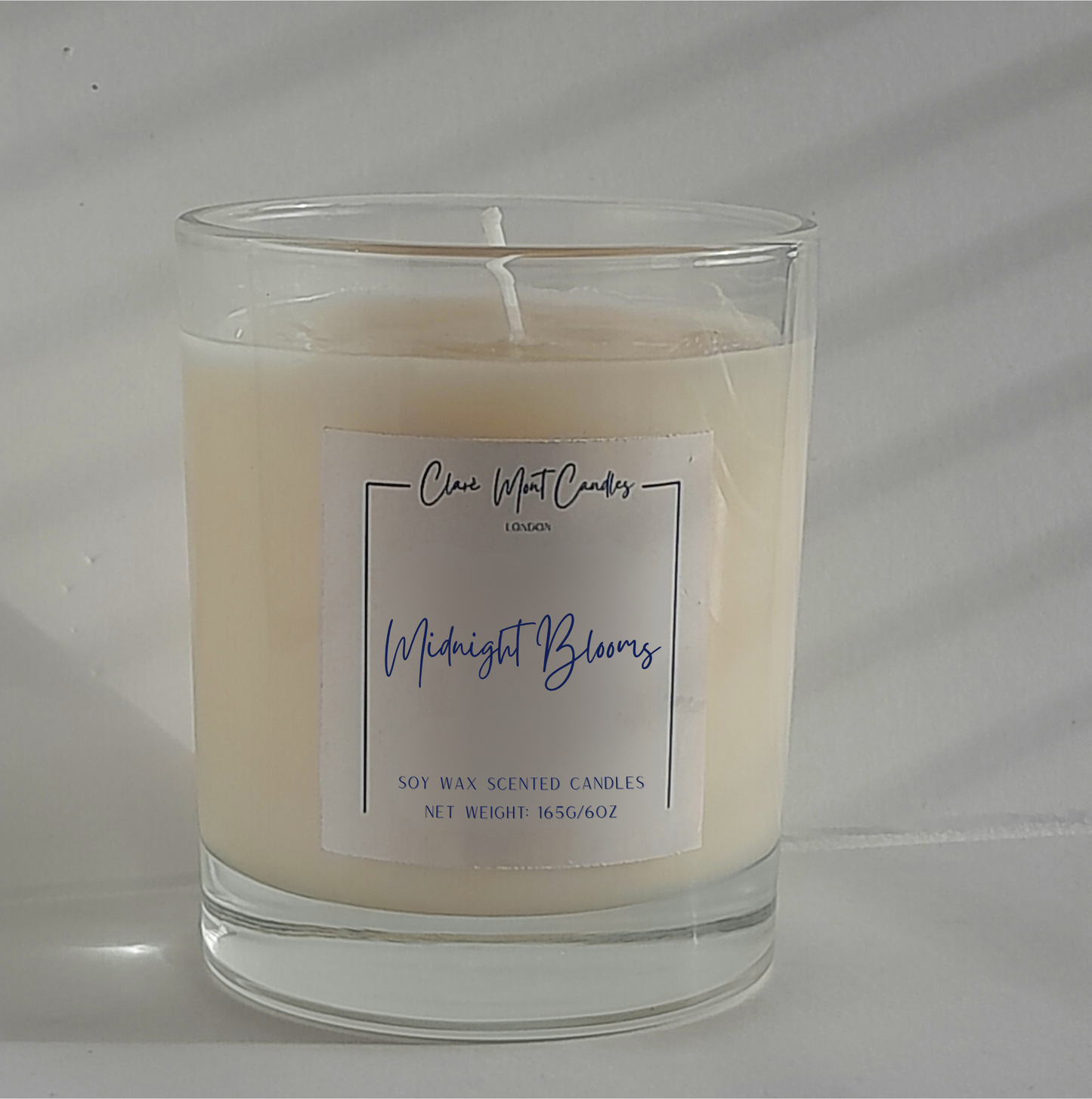 Clare` Mont Midnight Blooms 6oz gardenia soy candle with branded label - signature vegan floral fragrance candle