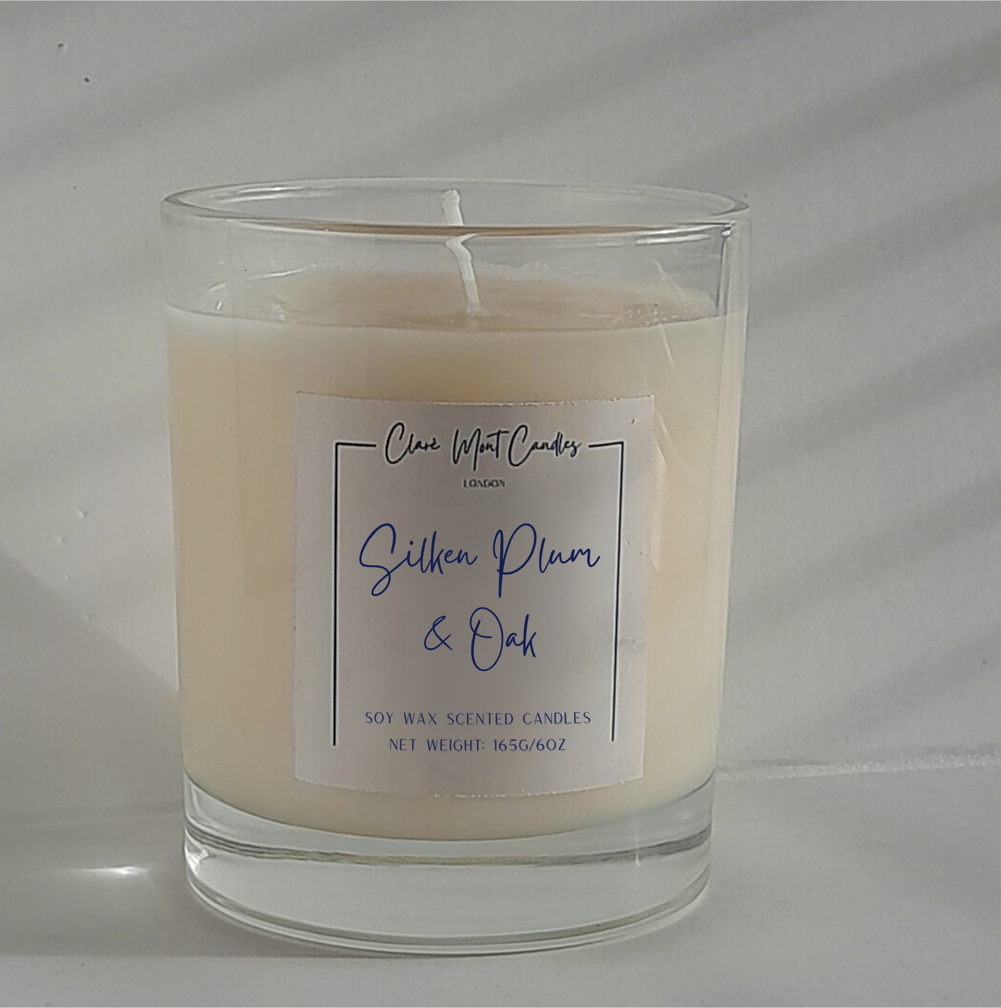 Scented candle with a label on a white background