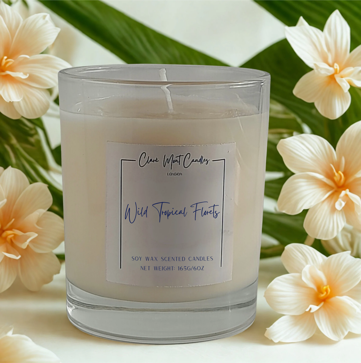 Candle with a label surrounded by tropical flowers