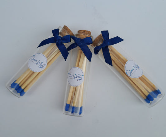 Matches displayed with blue ribbon around the neck