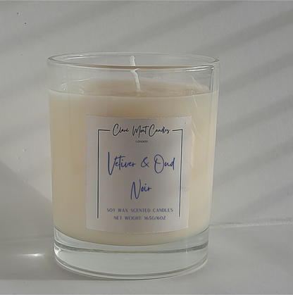 Candle with a label on a white background